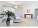 Open living space featuring tile flooring, a front door view, and modern decor with natural light at 104 Mark Twain Ln, Rotonda West, FL 33947