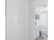 Bright and modern bathroom featuring a walk-in shower, vanity with storage, and coastal-themed decor at 1060 Haste Ln, Englewood, FL 34223