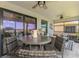 Comfortable screened lanai offering scenic views of the golf course, lake, and the surrounding community at 10788 Tarflower Dr # 201, Venice, FL 34293