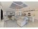 Open living room with modern finishes overlooks the kitchen and dining areas at 10788 Tarflower Dr # 201, Venice, FL 34293