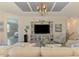 Cozy living room featuring neutral tones, stylish decor, and a built-in media center for a welcoming ambiance at 10788 Tarflower Dr # 201, Venice, FL 34293