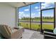 Relaxing screened lanai overlooking the peaceful water view at 12470 Wellen Golf St # 107, Venice, FL 34293