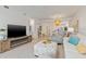 Open living area with stylish decor and ample space for relaxation and entertaining at 12470 Wellen Golf St # 107, Venice, FL 34293