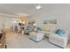 Spacious living area with neutral tones, comfortable seating, and an inviting atmosphere at 12470 Wellen Golf St # 107, Venice, FL 34293
