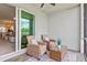 Cozy outdoor patio with comfortable seating and scenic views at 12470 Wellen Golf St # 107, Venice, FL 34293