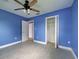 The bedroom features a large, open closet, allowing for ample storage and organization options at 1295 S Maryknoll Rd, Englewood, FL 34223