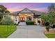 Elegant single-Gathering home with meticulous landscaping and charming curb appeal at 1415 Bayshore Dr, Englewood, FL 34223