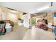 Spacious two car garage with storage, tools and lawn equipment at 1415 Bayshore Dr, Englewood, FL 34223