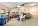 Spacious garage featuring ample storage and work areas at 1415 Bayshore Dr, Englewood, FL 34223