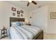 Bedroom with nautical decor and a ceiling fan at 15498 Seafoam Cir, Port Charlotte, FL 33981