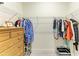 Walk-in closet featuring wire shelving, clothes racks, drawers, and shoe storage for optimal organization at 15498 Seafoam Cir, Port Charlotte, FL 33981