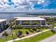 Stunning waterfront condo complex boasting lush landscaping and picturesque water views at 1701 Beach Rd # 207, Englewood, FL 34223