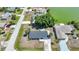 An aerial shot of a beautiful home with a new roof, near a pond and quiet street at 1730 Bluebird Ln, Englewood, FL 34224