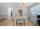 Cozy dining area featuring white accents, modern lighting, and stylish decor, ideal for Gathering meals at 1730 Bluebird Ln, Englewood, FL 34224