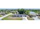 Charming single-story home with well-maintained landscaping and a long driveway at 1730 Bluebird Ln, Englewood, FL 34224