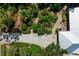 Bird's-eye view showcases a custom patio and stone path in the landscaped backyard at 1733 Belvidere Rd, Englewood, FL 34223