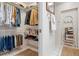 Walk-in closet and bathroom featuring tile floor at 1733 Belvidere Rd, Englewood, FL 34223