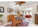 Cozy dining room with colorful rug, wooden table and chairs at 1733 Belvidere Rd, Englewood, FL 34223