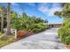 Lovely single-story home surrounded by mature trees and lush landscaping in a serene setting at 1733 Belvidere Rd, Englewood, FL 34223