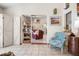 Spacious living room featuring tile flooring, decorative art, and bright natural light at 1733 Belvidere Rd, Englewood, FL 34223