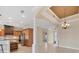 Bright dining room and kitchen featuring an open floor plan, tile flooring and modern appliances at 1784 Bayshore Dr, Englewood, FL 34223