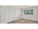 Bedroom featuring closet, a window with blinds, and a ceiling fan at 2106 Damascus Ln, Punta Gorda, FL 33983