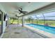 Covered pool with screened enclosure offers great outdoor living with view of the backyard at 2106 Damascus Ln, Punta Gorda, FL 33983