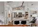 Modern kitchen featuring white cabinetry, marble countertops, and stainless steel appliances at 2679 Armenia Rd, North Port, FL 34286