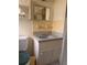 Bathroom featuring a sink, mirror, and toilet at 2911 Novus St, Sarasota, FL 34237