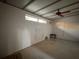 Neutral Living Room featuring a ceiling fan, window, and a carpet at 2911 Novus St, Sarasota, FL 34237