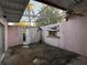 Enclosed patio featuring a ceiling fan and lots of natural light at 2911 Novus St, Sarasota, FL 34237