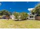 Beautiful backyard with a lush lawn at 348 W Wentworth St, Englewood, FL 34223