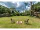 Backyard with firepit at 348 W Wentworth St, Englewood, FL 34223