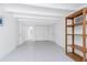 Spacious bedroom with tile floors, white walls, and ample closet space at 348 W Wentworth St, Englewood, FL 34223
