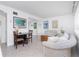 Comfortable living room with cozy furniture, decorative artwork, and bright, natural light at 348 W Wentworth St, Englewood, FL 34223