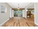 Living Room featuring hardwood floors, a view into the office, and a Florida room at 39 Caddy Rd, Rotonda West, FL 33947
