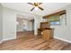 Office space with built-in desk and durable wood-look laminate floors with views to the dining room at 39 Caddy Rd, Rotonda West, FL 33947