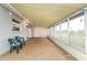 Enclosed sunroom offering natural light and a serene view, perfect for relaxation or entertainment at 39 Caddy Rd, Rotonda West, FL 33947
