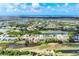 Picture of vast community with ocean view in the distance at 39 Pine Valley Ct, Rotonda West, FL 33947