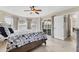 Main bedroom boasts plentiful windows and en-suite bathroom with lanai access at 39 Pine Valley Ct, Rotonda West, FL 33947