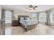 Main bedroom boasts plentiful windows and an en-suite bathroom at 39 Pine Valley Ct, Rotonda West, FL 33947