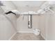 Walk-in closet with ample shelving and storage space at 39 Pine Valley Ct, Rotonda West, FL 33947