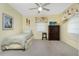 Cozy bedroom with carpet, closet, and window at 4221 Ulster Ave, North Port, FL 34287