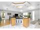 Bright, open kitchen with stainless steel appliances and a center island at 4221 Ulster Ave, North Port, FL 34287