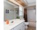 Bathroom featuring a white vanity, toilet, and shower with a curtain and unique ceiling decor at 4227 Winona St, Port Charlotte, FL 33948