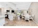Open concept kitchen flowing into the dining and living areas, perfect for entertaining at 4227 Winona St, Port Charlotte, FL 33948