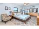 Bright bedroom with a comfortable bed, stylish decor, and scenic ocean view at 50 Meredith Dr # 9, Englewood, FL 34223