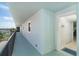 Hallway featuring recessed lighting, tile floors and leading to the front door and to an exterior view at 50 Meredith Dr # 9, Englewood, FL 34223