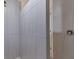 Close-up of a modern tiled walk-in shower with sleek fixtures and design at 5781 Elton Rd, Venice, FL 34293