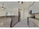 Bright, modern kitchen with granite countertops, stainless steel appliances, and tile flooring at 5781 Elton Rd, Venice, FL 34293